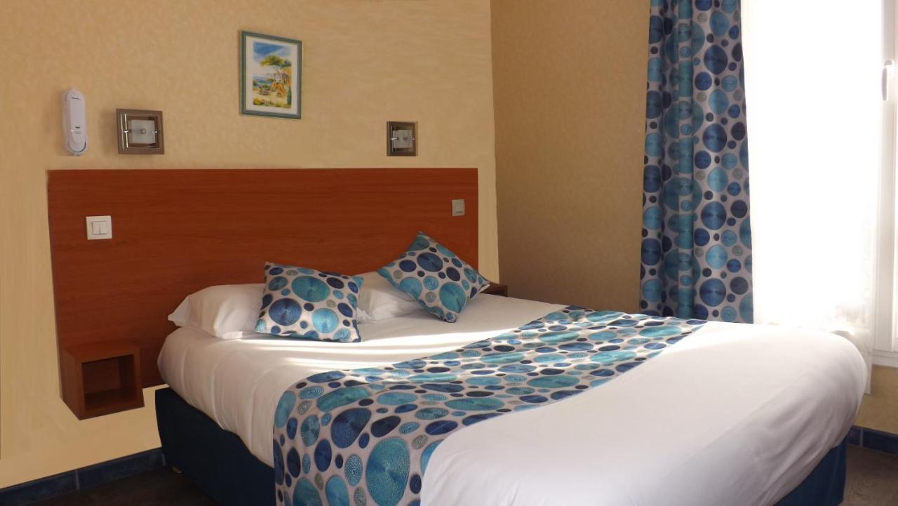 Hotel De La Place Des Alpes Париж Екстериор снимка
